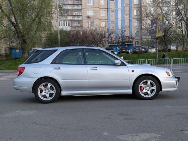 Серый Субару Impreza WRX, объемом двигателя 2 л и пробегом 222 тыс. км за 12000 $, фото 4 на Automoto.ua