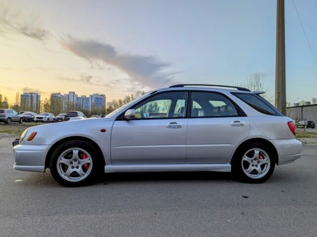 Серый Субару Impreza WRX, объемом двигателя 2 л и пробегом 222 тыс. км за 12000 $, фото 5 на Automoto.ua