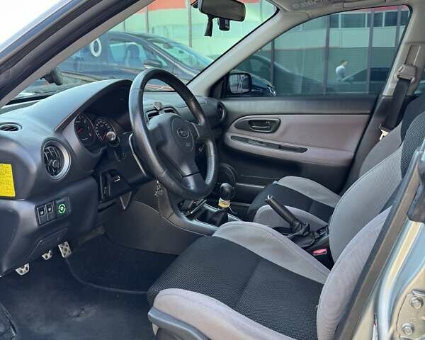 Серый Субару Impreza WRX, объемом двигателя 2.5 л и пробегом 240 тыс. км за 5600 $, фото 6 на Automoto.ua