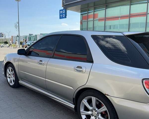 Серый Субару Impreza WRX, объемом двигателя 2.5 л и пробегом 240 тыс. км за 5600 $, фото 2 на Automoto.ua