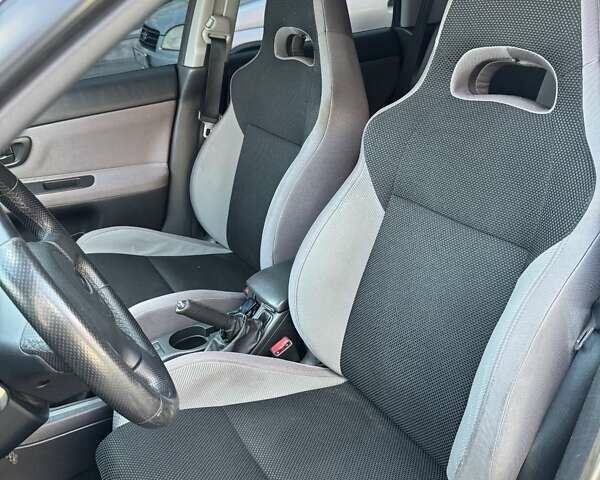 Серый Субару Impreza WRX, объемом двигателя 2.5 л и пробегом 240 тыс. км за 5600 $, фото 5 на Automoto.ua