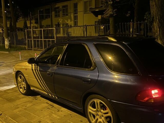 Синий Субару Impreza WRX, объемом двигателя 2 л и пробегом 220 тыс. км за 4700 $, фото 5 на Automoto.ua