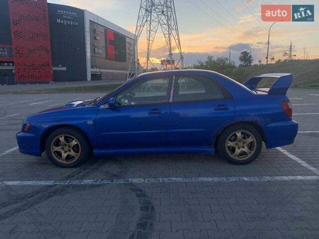 Синий Субару Impreza WRX, объемом двигателя 1.99 л и пробегом 280 тыс. км за 5500 $, фото 2 на Automoto.ua