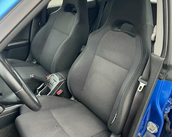 Синій Субару Impreza WRX, об'ємом двигуна 2 л та пробігом 246 тис. км за 7500 $, фото 7 на Automoto.ua