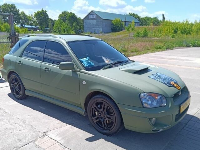 Зеленый Субару Impreza WRX, объемом двигателя 2 л и пробегом 230 тыс. км за 5900 $, фото 1 на Automoto.ua