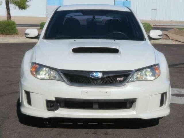 Белый Субару Импреза ВРХ СТИ, объемом двигателя 2.5 л и пробегом 81 тыс. км за 7600 $, фото 1 на Automoto.ua