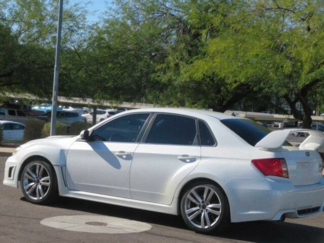 Белый Субару Импреза ВРХ СТИ, объемом двигателя 2.5 л и пробегом 81 тыс. км за 7600 $, фото 5 на Automoto.ua