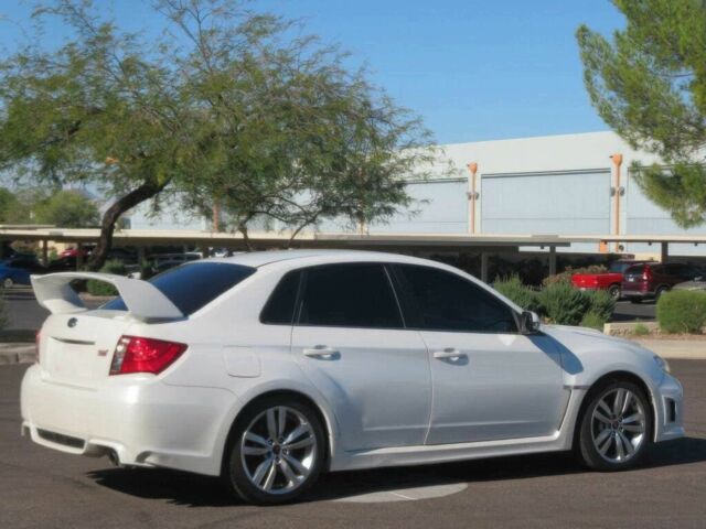 Белый Субару Импреза ВРХ СТИ, объемом двигателя 2.5 л и пробегом 81 тыс. км за 7600 $, фото 3 на Automoto.ua