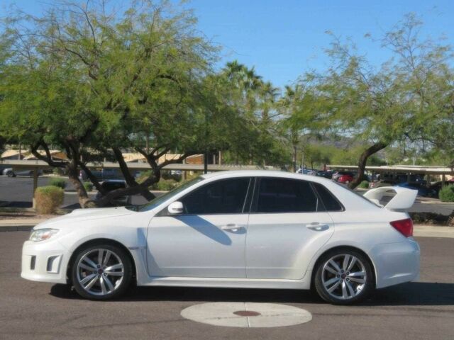 Белый Субару Импреза ВРХ СТИ, объемом двигателя 2.5 л и пробегом 81 тыс. км за 7600 $, фото 6 на Automoto.ua