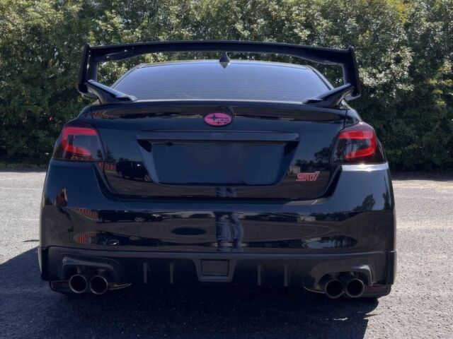 Черный Субару Импреза ВРХ СТИ, объемом двигателя 2.5 л и пробегом 76 тыс. км за 11300 $, фото 5 на Automoto.ua
