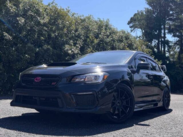 Черный Субару Импреза ВРХ СТИ, объемом двигателя 2.5 л и пробегом 76 тыс. км за 11300 $, фото 2 на Automoto.ua