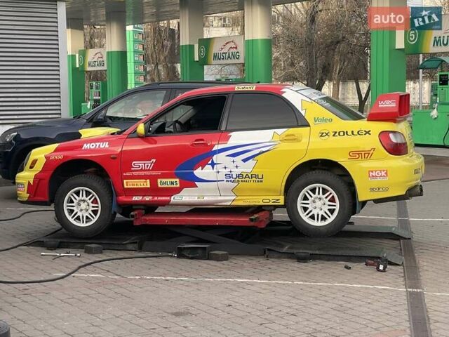 Червоний Субару Імпреза ВРХ СТІ, об'ємом двигуна 1.99 л та пробігом 170 тис. км за 22500 $, фото 16 на Automoto.ua