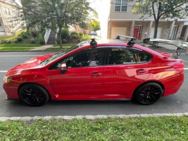 Червоний Субару Імпреза ВРХ СТІ, об'ємом двигуна 2.5 л та пробігом 62 тис. км за 13200 $, фото 3 на Automoto.ua