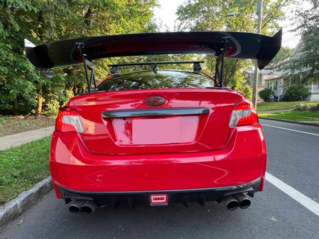 Червоний Субару Імпреза ВРХ СТІ, об'ємом двигуна 2.5 л та пробігом 62 тис. км за 13200 $, фото 5 на Automoto.ua