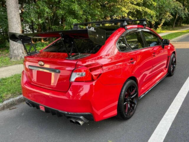 Червоний Субару Імпреза ВРХ СТІ, об'ємом двигуна 2.5 л та пробігом 62 тис. км за 13200 $, фото 6 на Automoto.ua