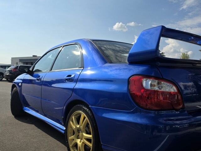 Синий Субару Импреза ВРХ СТИ, объемом двигателя 2 л и пробегом 120 тыс. км за 17000 $, фото 4 на Automoto.ua