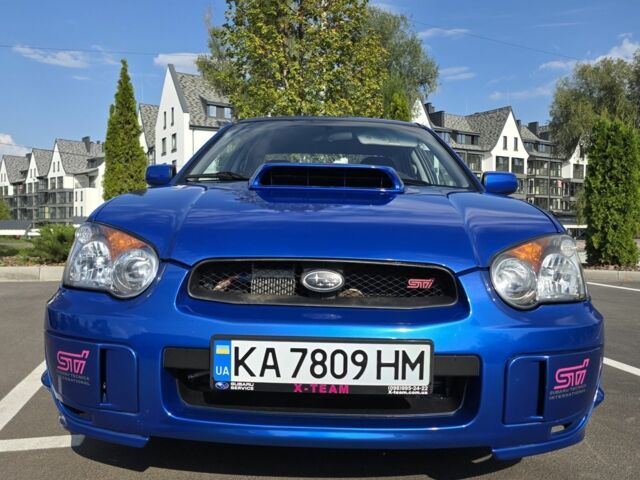 Синий Субару Импреза ВРХ СТИ, объемом двигателя 2 л и пробегом 120 тыс. км за 17000 $, фото 5 на Automoto.ua