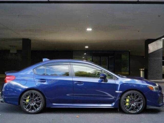 Синий Субару Импреза ВРХ СТИ, объемом двигателя 2.5 л и пробегом 90 тыс. км за 11000 $, фото 6 на Automoto.ua