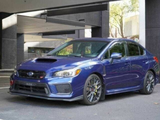 Синий Субару Импреза ВРХ СТИ, объемом двигателя 2.5 л и пробегом 90 тыс. км за 11000 $, фото 2 на Automoto.ua