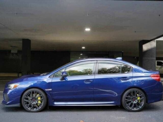 Синий Субару Импреза ВРХ СТИ, объемом двигателя 2.5 л и пробегом 90 тыс. км за 11000 $, фото 5 на Automoto.ua