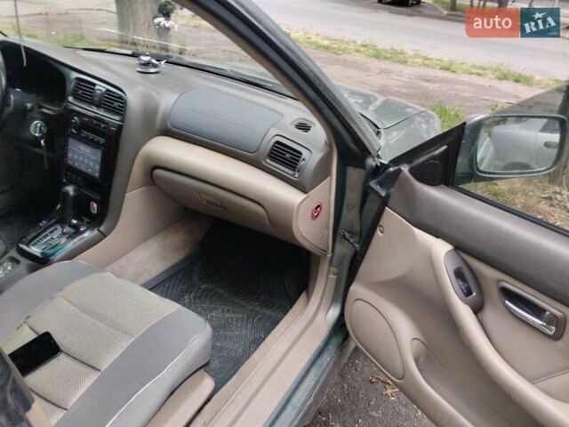 Сірий Субару Legacy Outback, об'ємом двигуна 3 л та пробігом 450 тис. км за 3300 $, фото 3 на Automoto.ua