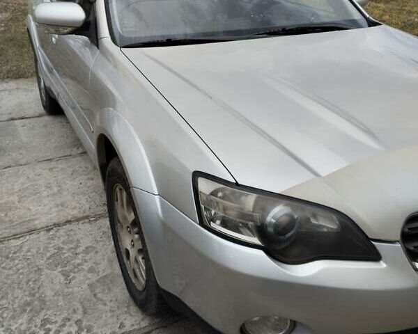 Серый Субару Legacy Outback, объемом двигателя 2.5 л и пробегом 227 тыс. км за 6450 $, фото 2 на Automoto.ua