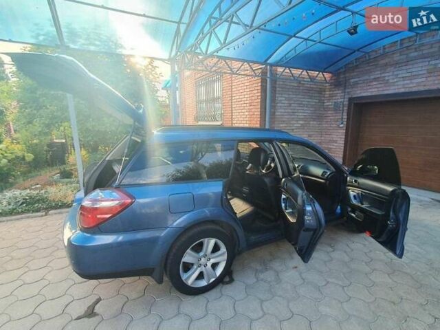 Синий Субару Legacy Outback, объемом двигателя 2.5 л и пробегом 327 тыс. км за 7000 $, фото 5 на Automoto.ua