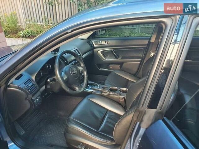 Синий Субару Legacy Outback, объемом двигателя 2.5 л и пробегом 327 тыс. км за 7000 $, фото 1 на Automoto.ua