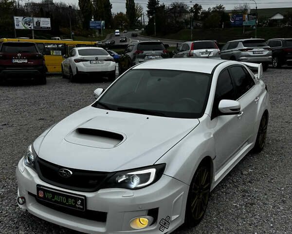 Субару WRX STI 2014 в Белой Церкве на Automoto.ua Белый Субару WRX STI, объемом двигателя 2.46 л и пробегом 68 тыс. км за 18500 $, фото 3 на Automoto.ua