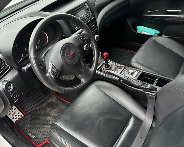 Субару WRX STI 2014 в Белой Церкве на Automoto.ua Белый Субару WRX STI, объемом двигателя 2.46 л и пробегом 68 тыс. км за 18500 $, фото 14 на Automoto.ua