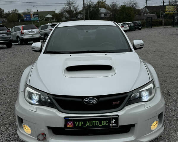 Субару WRX STI 2014 в Белой Церкве на Automoto.ua Белый Субару WRX STI, объемом двигателя 2.46 л и пробегом 68 тыс. км за 18500 $, фото 2 на Automoto.ua