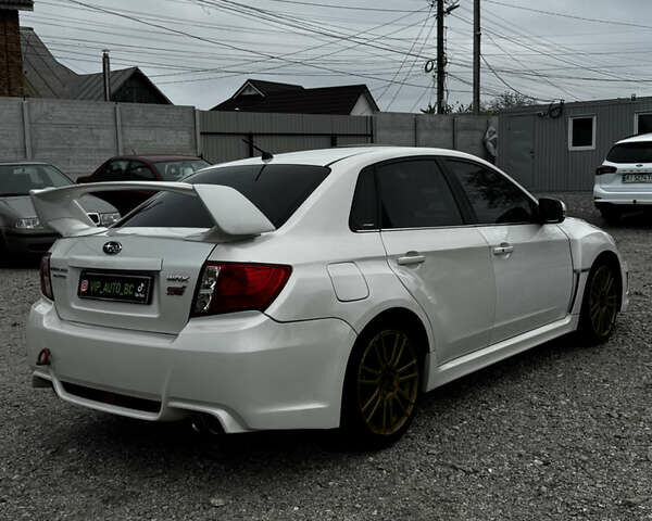 Субару WRX STI 2014 в Белой Церкве на Automoto.ua Белый Субару WRX STI, объемом двигателя 2.46 л и пробегом 68 тыс. км за 18500 $, фото 10 на Automoto.ua