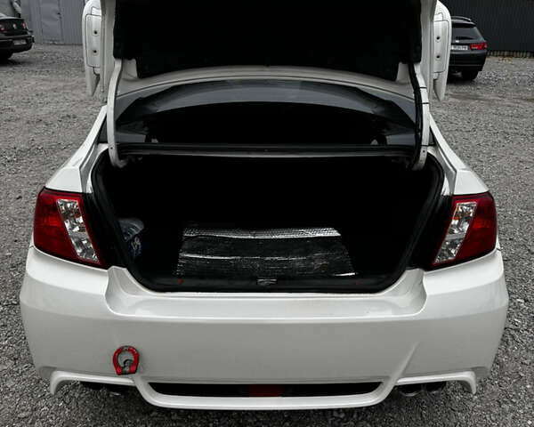 Субару WRX STI 2014 в Белой Церкве на Automoto.ua Белый Субару WRX STI, объемом двигателя 2.46 л и пробегом 68 тыс. км за 18500 $, фото 13 на Automoto.ua