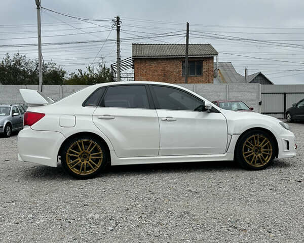 Субару WRX STI 2014 в Белой Церкве на Automoto.ua Белый Субару WRX STI, объемом двигателя 2.46 л и пробегом 68 тыс. км за 18500 $, фото 11 на Automoto.ua