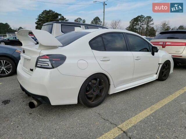 Белый Субару WRX STI, объемом двигателя 2.5 л и пробегом 129 тыс. км за 5000 $, фото 3 на Automoto.ua