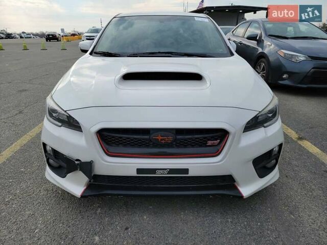 Белый Субару WRX STI, объемом двигателя 2.5 л и пробегом 129 тыс. км за 5000 $, фото 1 на Automoto.ua