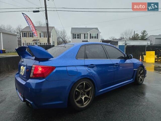 Синий Субару WRX STI, объемом двигателя 2.5 л и пробегом 219 тыс. км за 5350 $, фото 4 на Automoto.ua