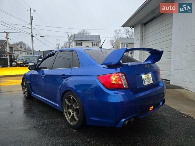 Синий Субару WRX STI, объемом двигателя 2.5 л и пробегом 219 тыс. км за 5350 $, фото 3 на Automoto.ua