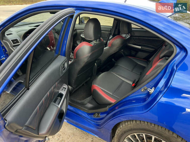 Синий Субару WRX STI, объемом двигателя 2.46 л и пробегом 127 тыс. км за 25000 $, фото 7 на Automoto.ua