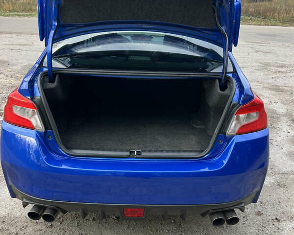 Синий Субару WRX STI, объемом двигателя 2.46 л и пробегом 127 тыс. км за 25000 $, фото 12 на Automoto.ua