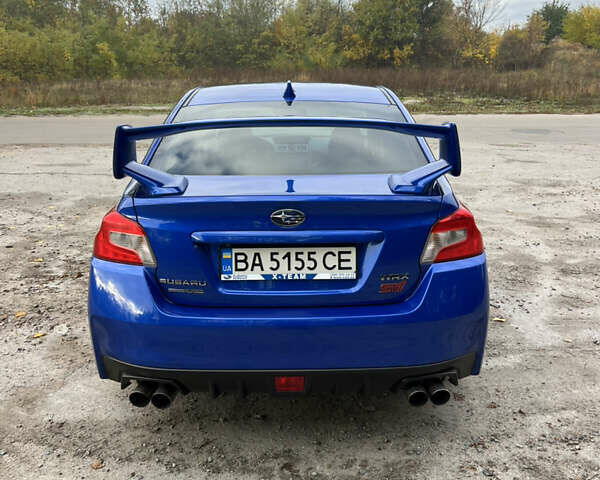 Синий Субару WRX STI, объемом двигателя 2.46 л и пробегом 127 тыс. км за 25000 $, фото 6 на Automoto.ua