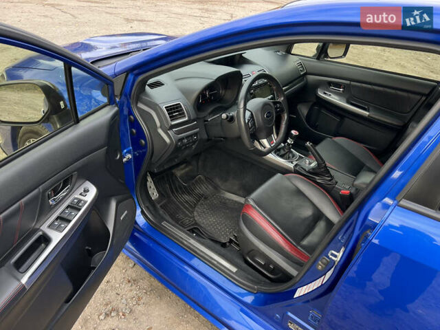 Синий Субару WRX STI, объемом двигателя 2.46 л и пробегом 127 тыс. км за 25000 $, фото 8 на Automoto.ua