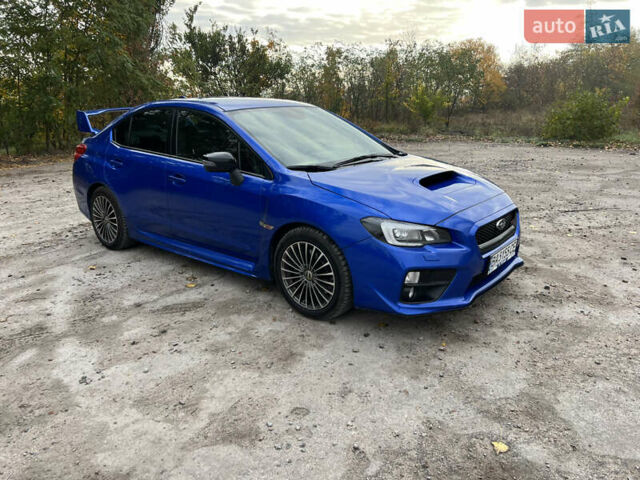 Синий Субару WRX STI, объемом двигателя 2.46 л и пробегом 127 тыс. км за 25000 $, фото 2 на Automoto.ua