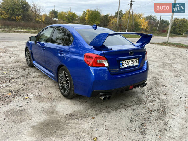 Синий Субару WRX STI, объемом двигателя 2.46 л и пробегом 127 тыс. км за 25000 $, фото 5 на Automoto.ua