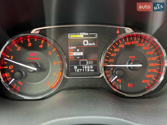 Синий Субару WRX STI, объемом двигателя 2.46 л и пробегом 127 тыс. км за 25000 $, фото 13 на Automoto.ua