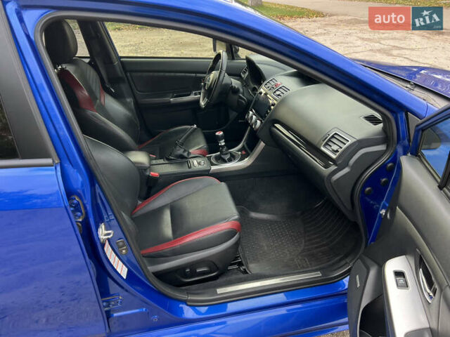 Синий Субару WRX STI, объемом двигателя 2.46 л и пробегом 127 тыс. км за 25000 $, фото 10 на Automoto.ua