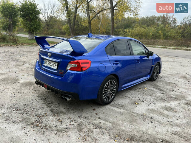 Синий Субару WRX STI, объемом двигателя 2.46 л и пробегом 127 тыс. км за 25000 $, фото 4 на Automoto.ua