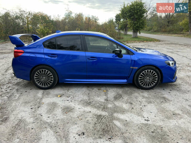 Синий Субару WRX STI, объемом двигателя 2.46 л и пробегом 127 тыс. км за 25000 $, фото 3 на Automoto.ua