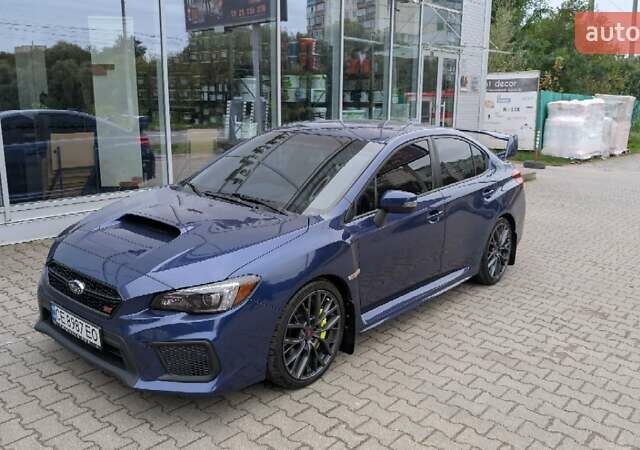 Синий Субару WRX STI, объемом двигателя 2.5 л и пробегом 129 тыс. км за 26500 $, фото 22 на Automoto.ua