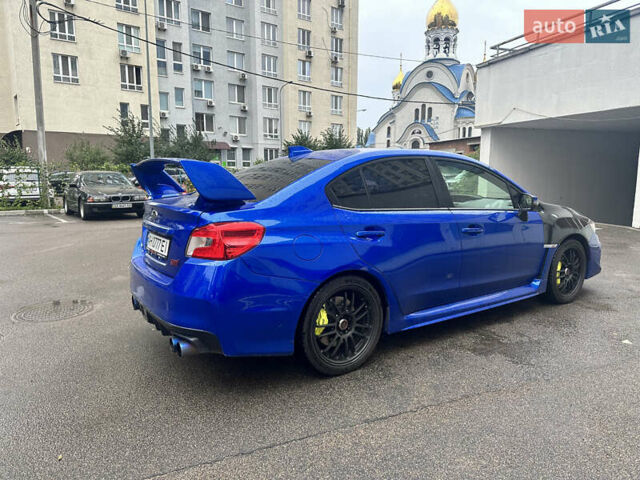 Синий Субару WRX STI, объемом двигателя 2.46 л и пробегом 37 тыс. км за 27000 $, фото 3 на Automoto.ua